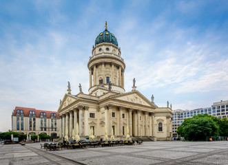 Fototapeta na wymiar View on German Cathedral and trees on Gendarmenmarkt in Berlin, Germany, Europe