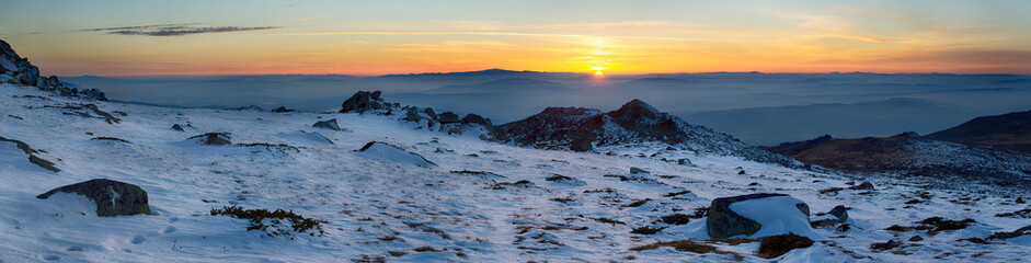 Wintry sunset panoramic background in mountain