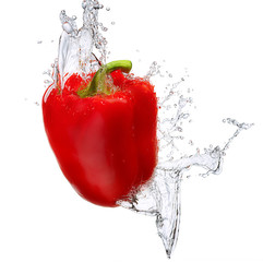 Water splash and vegetables isolated on white backgroud with clipping path. Fresh bell pepper