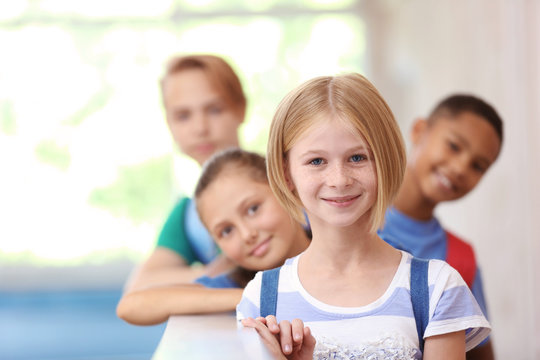 Cute Kids In School Hallway