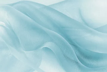 Fotobehang organza fabric in blue color © severija