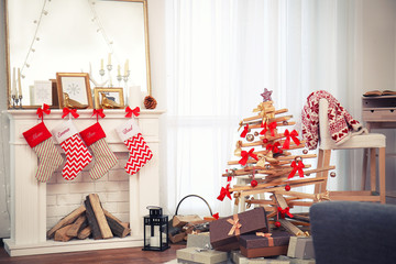 Creative Christmas tree in living room interior