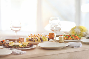 Table setting for holiday buffet, close up view