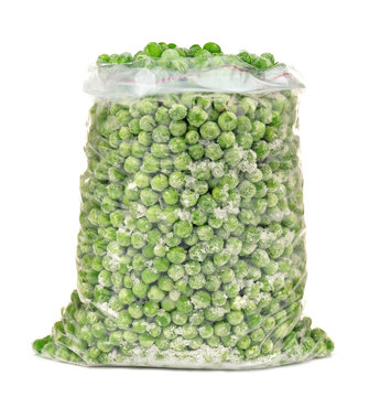 Frozen peas on white background