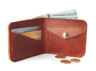 Stylish leather wallet with money on white background