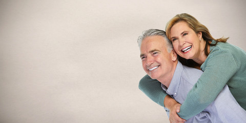 Senior couple smiling.