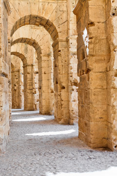 Demolished ancient walls and arches in Tunisian Amphitheatre in El Djem, Tunisia, Africa