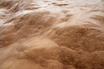 texture sulfur deposits under a stream water