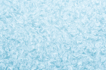 Beautiful background texture of frost crystals on glass