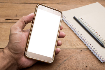 Hand man holding smart phone mobile white screen on office table