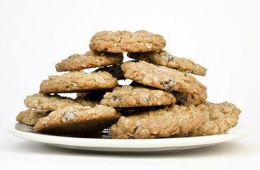 Stack of homemade oatmeal raisin cookies on a plate. Horizontal.