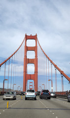 Fototapeta na wymiar Traffic crossing the Golden Gate Bridge. Vertical.