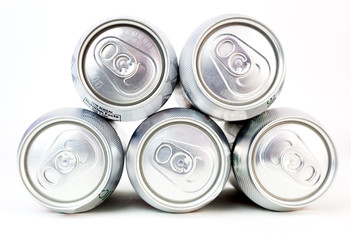 Aluminum beverage cans on white background. Front view. Horizontal.