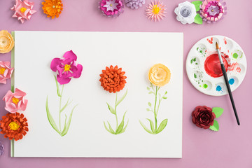 Colourful handmade paper flowers and watercolor painting