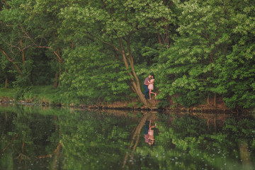 Naklejka na ściany i meble Happy couple at a lake