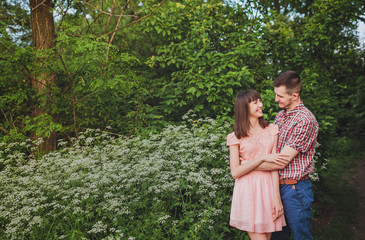 Fototapeta premium young couple in love together on nature