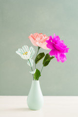 Bouquet of handmade paper flowers in a vase
