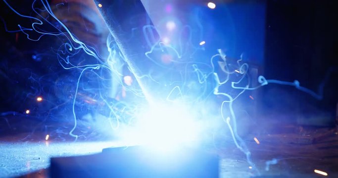 Welder welding a metal