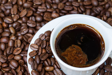Coffee motif  wallpaper,  grains and a cup of espresso 