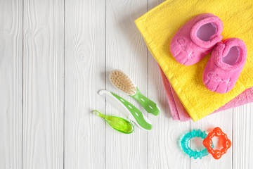 baby accessories for bath on wooden background