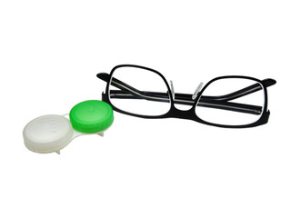 black glasses and a container for lenses on a white background