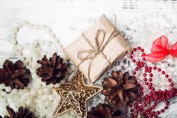 Christmas gift on grey wooden background