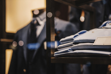 Shirts and suits in a men luxury store