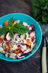 Fresh salad with seafood and vegetables