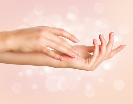 Beautiful woman hands. Spa and manicure concept. Female hands with french manicure