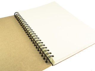 Open notebook with brown cover close up on white background.