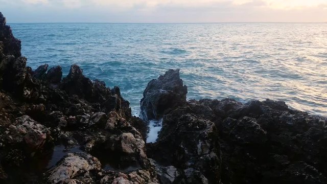 Huge Waves Crash into Rocks