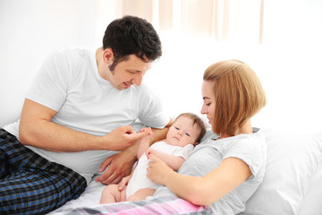 Parents with baby at home