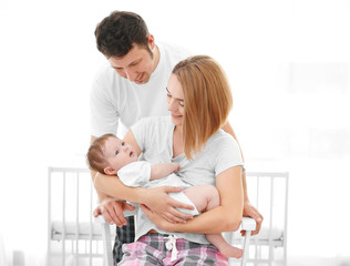 Parents with baby at home