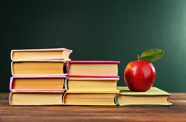 Back to school concept with apple and books
