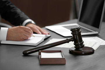 Judge gavel on table, closeup