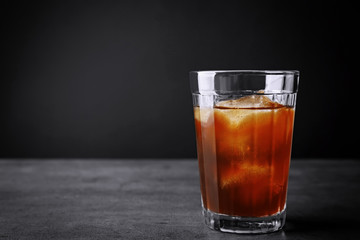 Iced coffee on grey background
