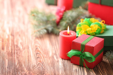 Christmas concept. Gift boxes and decorations on wooden table, closeup