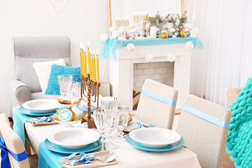 Table served for Hanukkah in living room