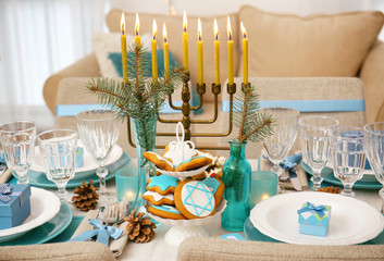 Table served for Hanukkah in living room