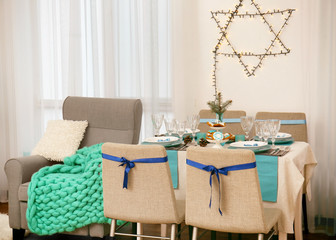 Interior of beautiful living room decorated for Hanukkah