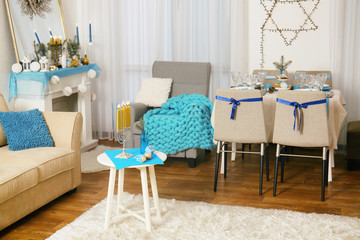 Interior of beautiful living room decorated for Hanukkah