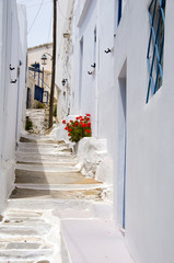 street scene classic Greek Island architecture with painted walk
