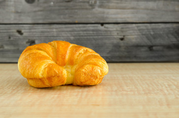 croissants on a wooden background