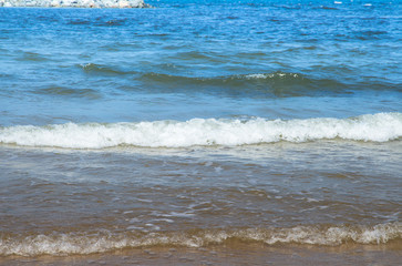 Blue sea with waves and sand beach(wave,sea)
