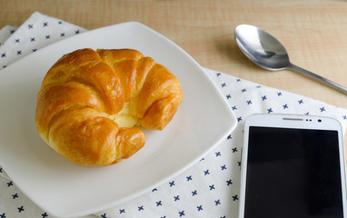 croissants on a wooden background