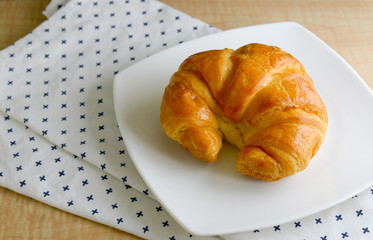 croissants on a wooden background