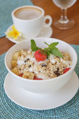 Healthy breakfast - cereal bowl with fruits
