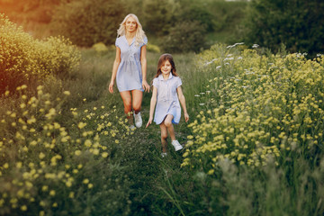Fototapeta premium mom and daughter outside