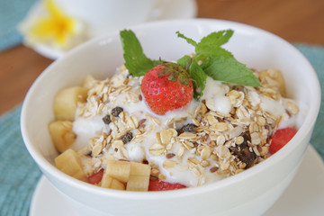Healthy breakfast - cereal bowl with fruits