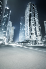 modern buildings at night and road